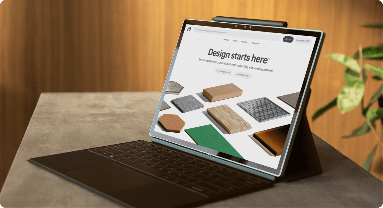 Aerial view of a beach with turquoise water and green cliffs