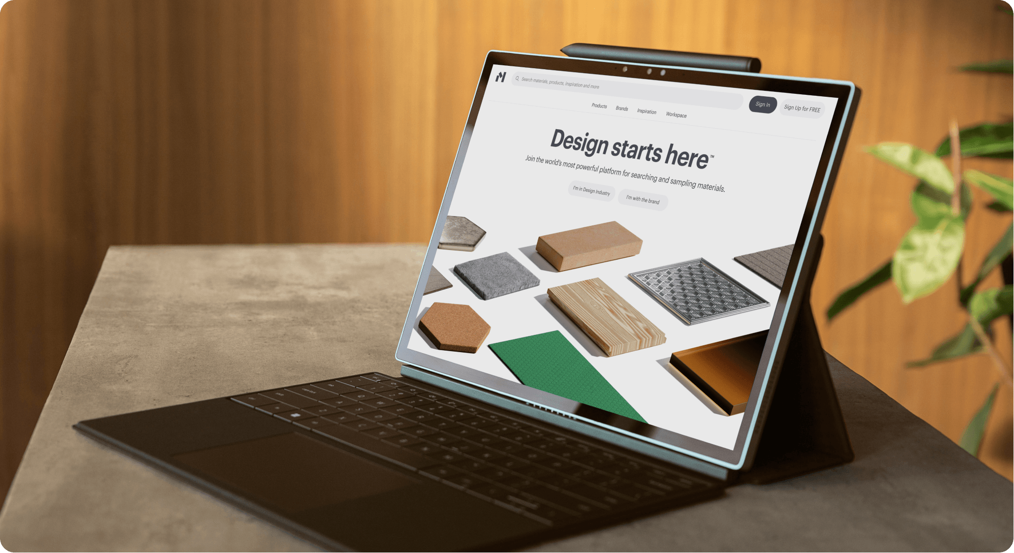 Aerial view of a beach with turquoise water and green cliffs